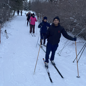 lineup of skiiers